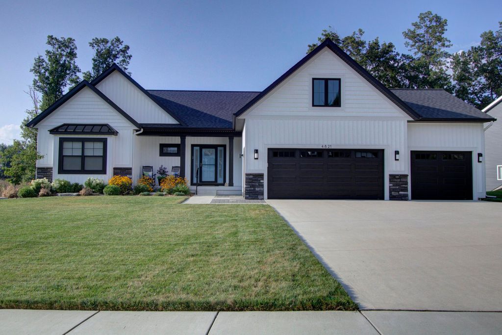 Photo of 4821 Honeycrisp Drive NE, Rockford, MI 49341 (MLS # 26009321)