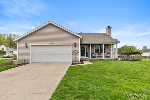 Photo of 7170 Quintara Drive NE, Comstock Park, MI 49321 (MLS # 26018926)