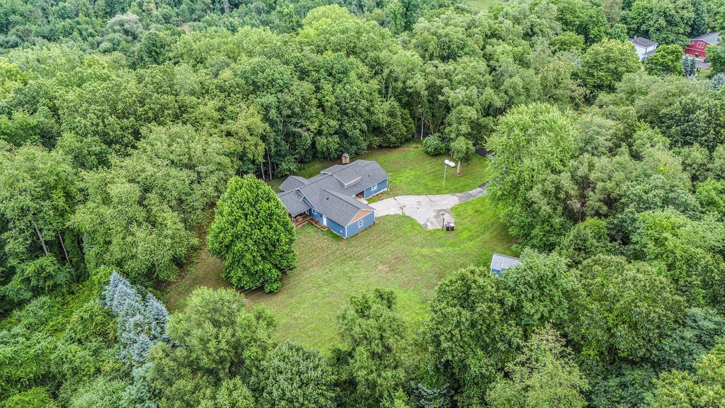 Photo of 8300 Grand River Drive SE, Ada, MI 49301 (MLS # 25042752)