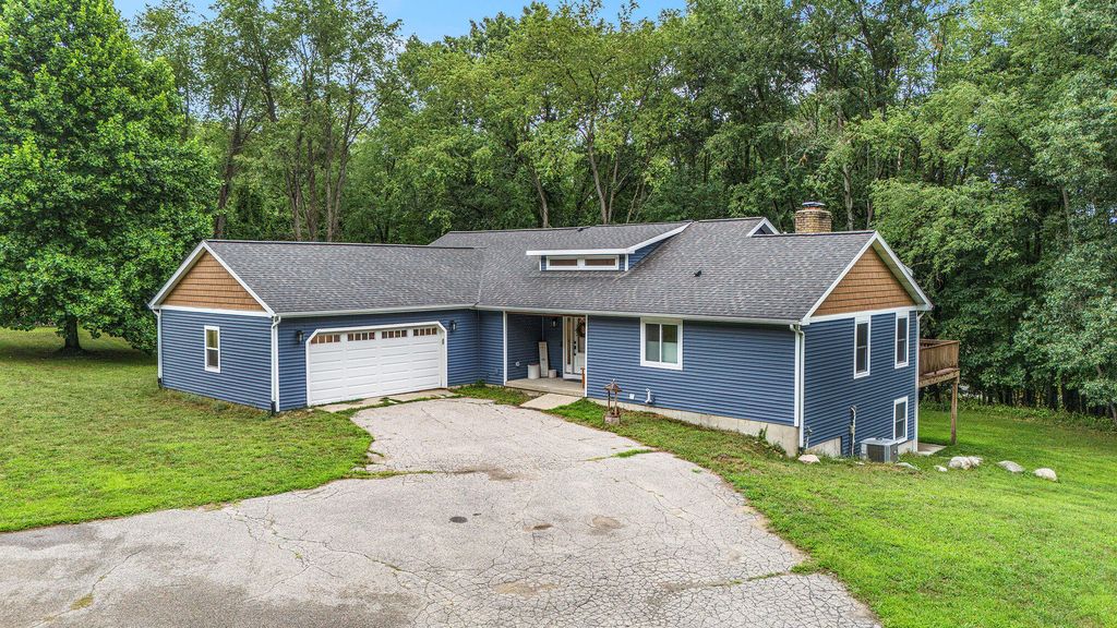 Photo of 8300 Grand River Drive SE, Ada, MI 49301 (MLS # 25042752)