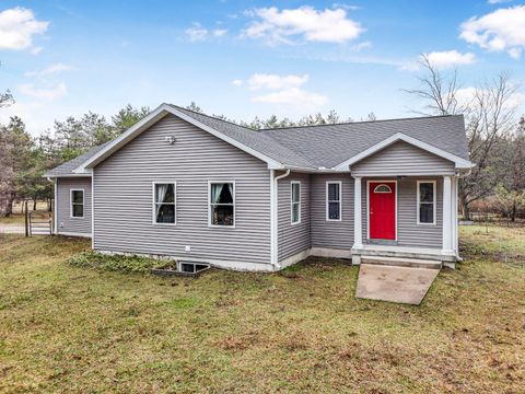 Photo of 8530 Homestead Rd Rd, Benzonia, MI 49616 (MLS # 25026544)