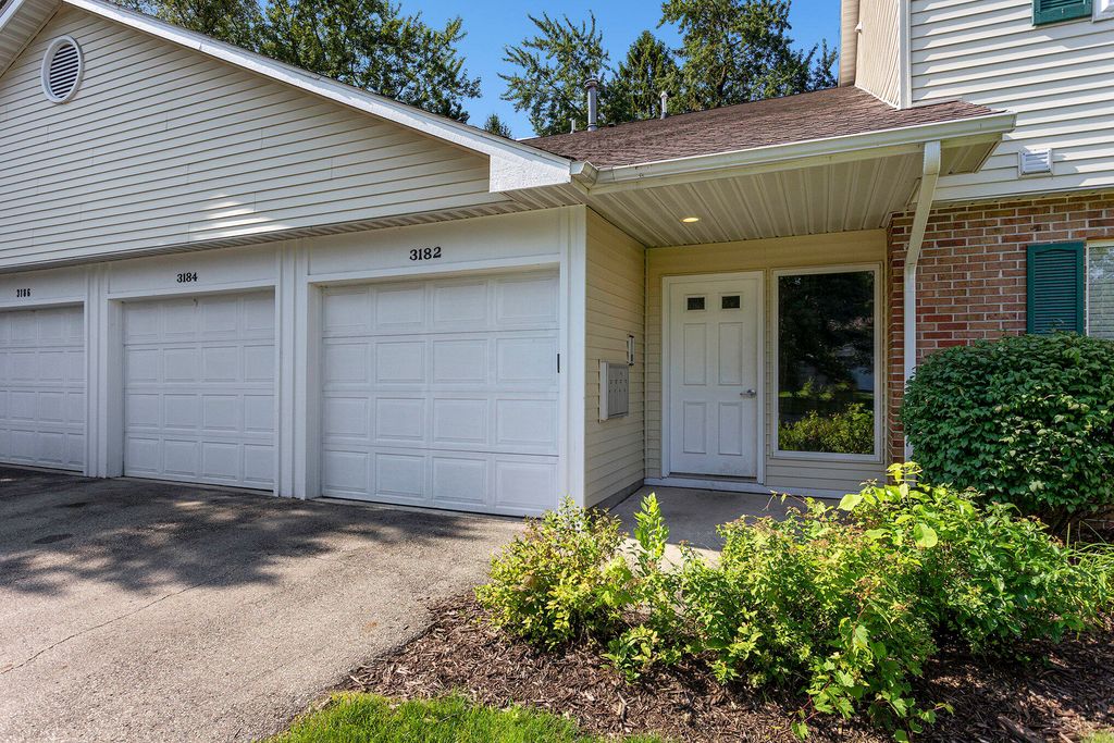 Photo of 3184 Windcrest Drive NE, Grand Rapids, MI 49525 (MLS # 23025865)