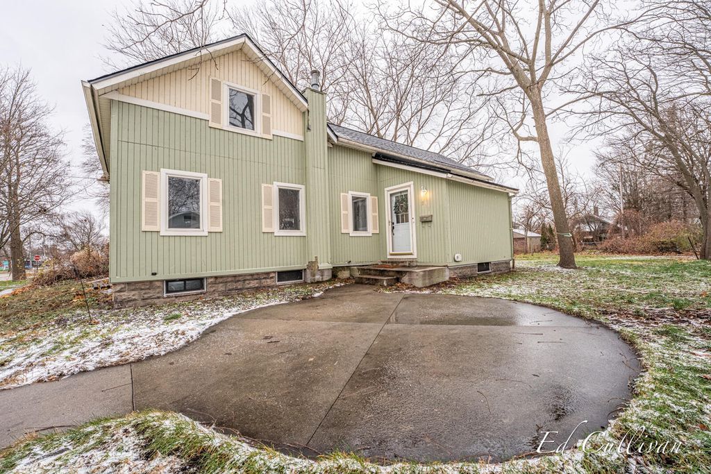 Photo of 211 N Division Street, Spring Lake, MI 49456 (MLS # 25060015)