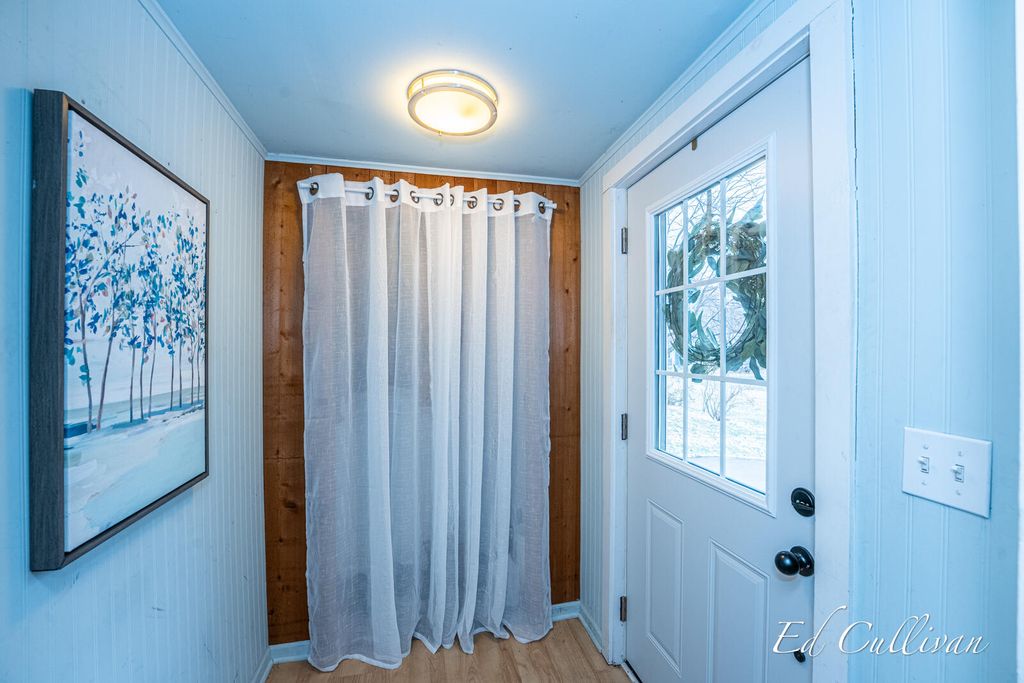 Photo of 211 N Division Street, Spring Lake, MI 49456 (MLS # 25060015)