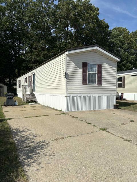 Photo of 1418 Saskatoon Avenue, Norton Shores, MI 49444 (MLS # 25062830)