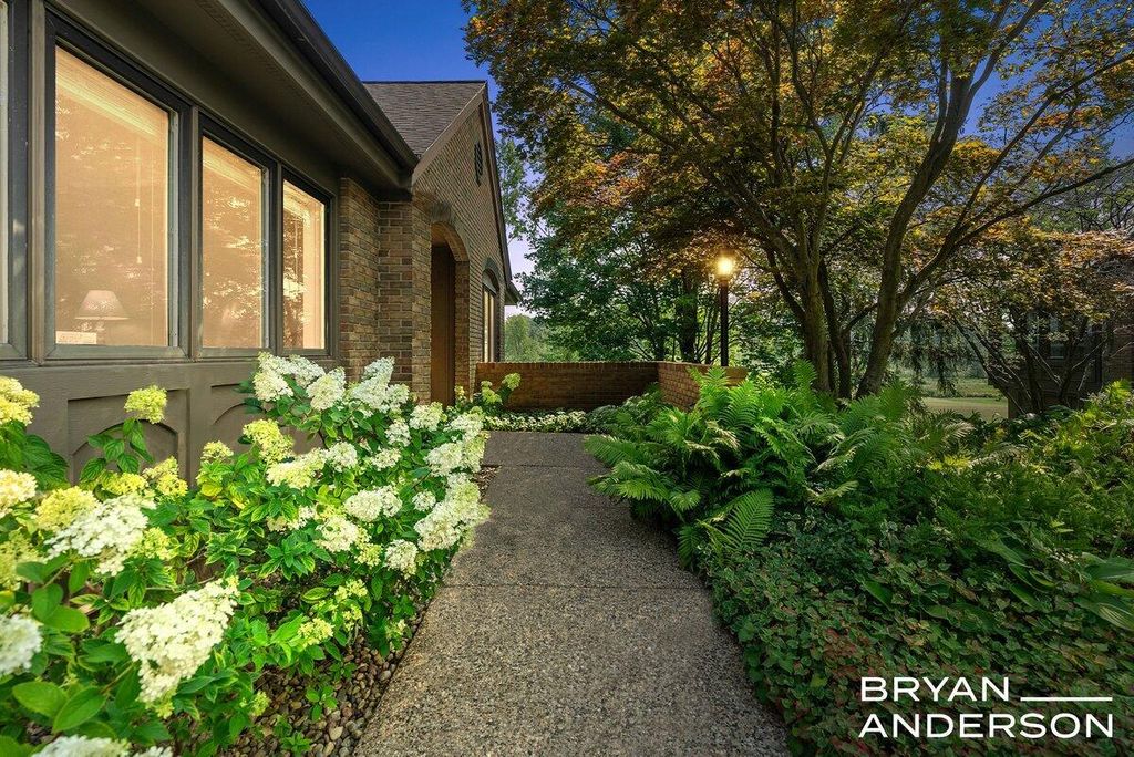 Photo of 696 Cascade Hills Hollow SE, Grand Rapids, MI 49546 (MLS # 25050869)