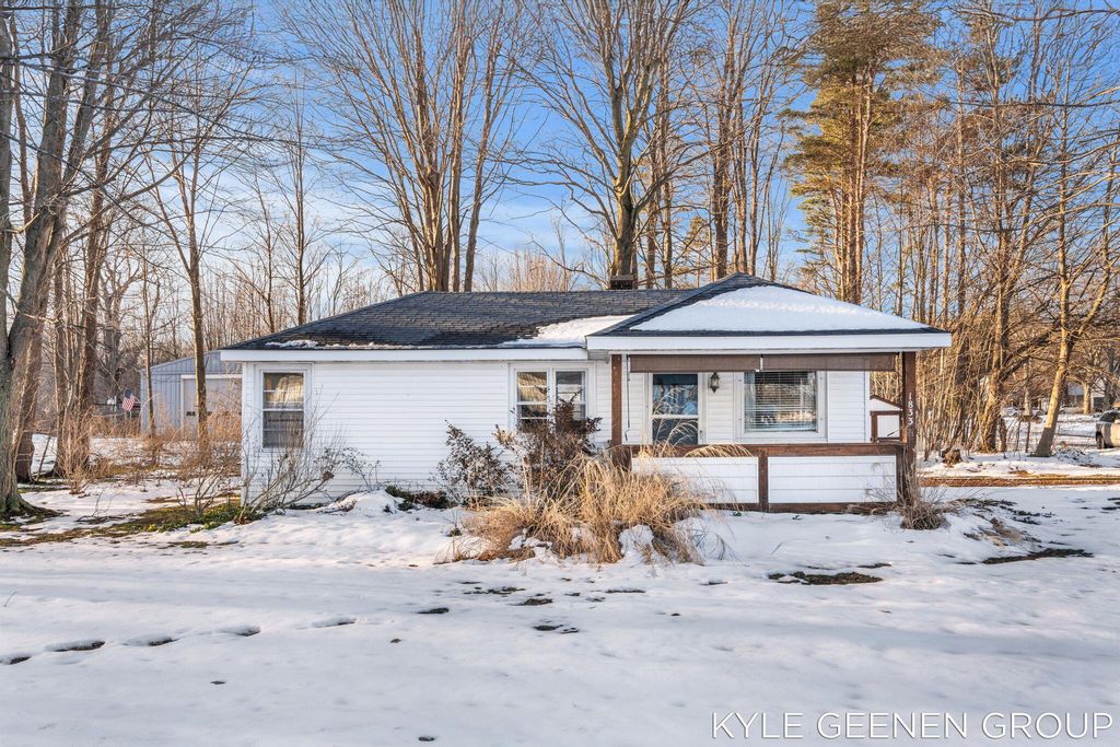 Photo of 1833 Ottawa Beach Road, Holland, MI 49424 (MLS # 26000350)
