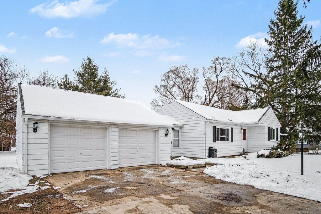 Photo of 665 4 Mile Road NW, Comstock Park, MI 49321 (MLS # 26005295)