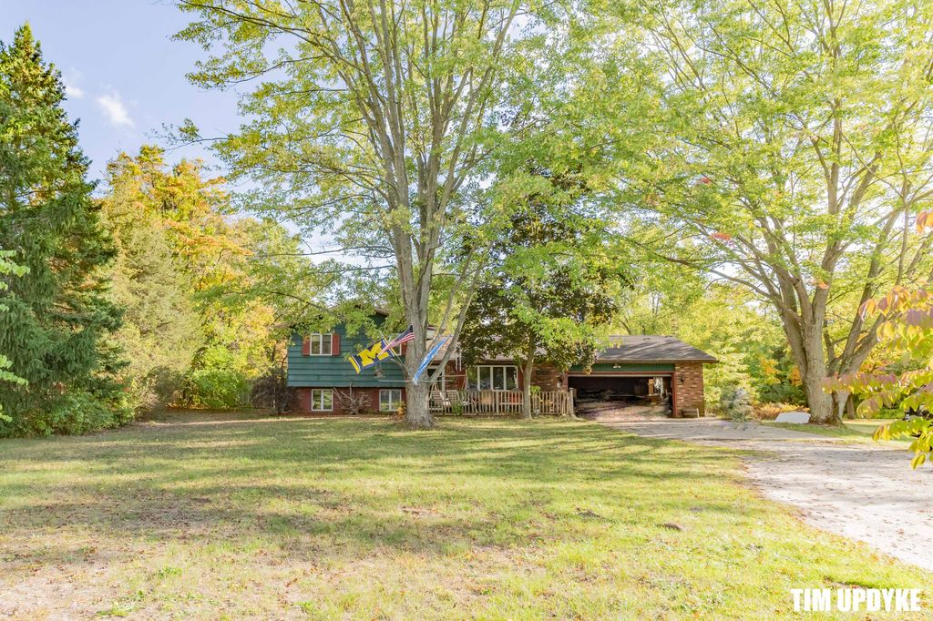 Photo of 1763 E Pontaluna Road, Spring Lake, MI 49456 (MLS # 25049716)
