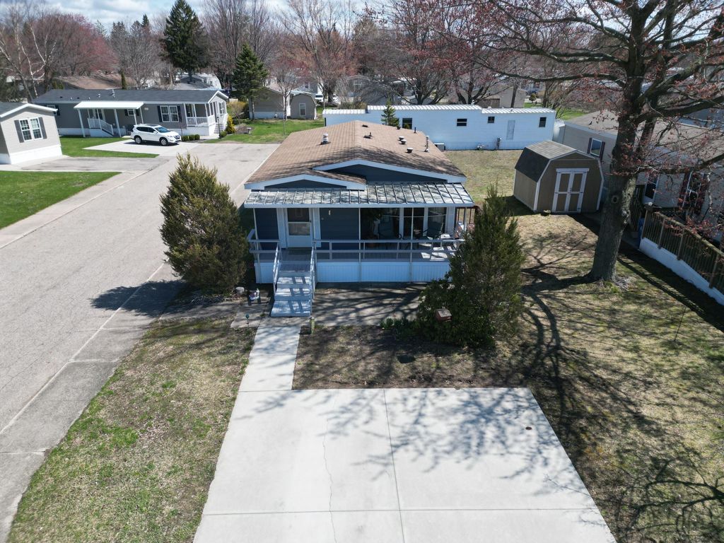 Photo of 1700 Robbins Road #163, Grand Haven, MI 49417 (MLS # 26014396)