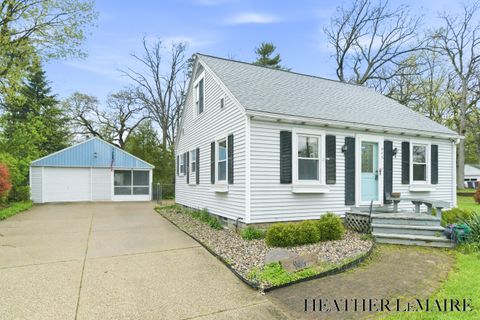 Photo of 945 4 Mile Road NE, Grand Rapids, MI 49525 (MLS # 26018879)