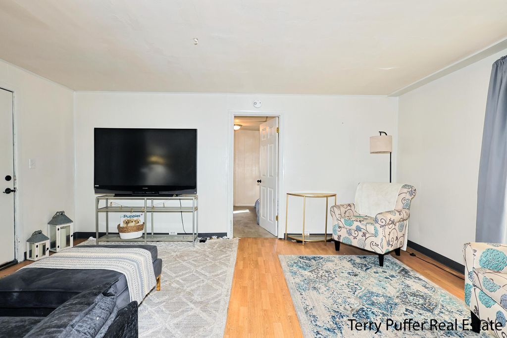 Photo of 1653 Mcilwraith Street, Muskegon, MI 49442 (MLS # 25052916)