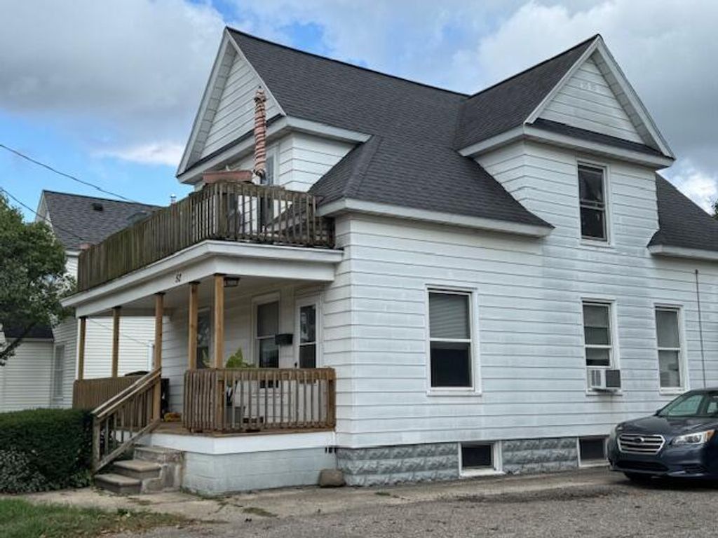 Photo of 52 W Washington Avenue, Zeeland, MI 49464 (MLS # 25051542)