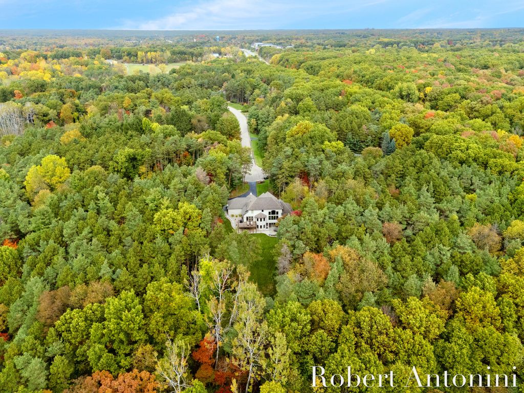 Photo of 4777 Windcliff Drive NE, Rockford, MI 49341 (MLS # 25054333)