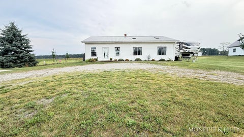Photo of 8454 E Skeels Road, Holton, MI 49425 (MLS # 26047020)