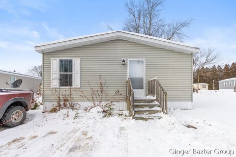 Photo of 1800 W Main Street #105, Lowell, MI 49331 (MLS # 26007594)