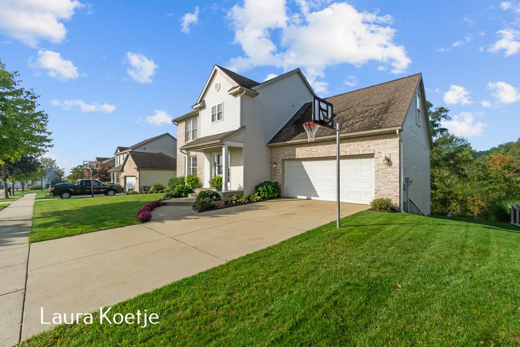 Photo of 165 Hawthorne Court NE, Rockford, MI 49341 (MLS # 25050018)