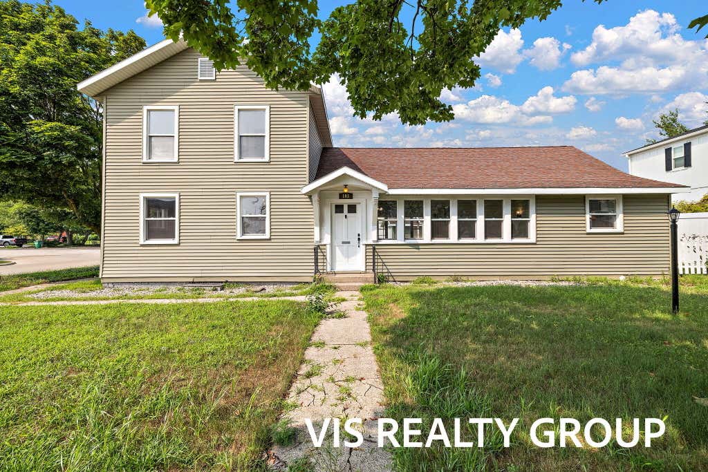 Photo of 103 E Savidge Street, Spring Lake, MI 49456 (MLS # 26022197)