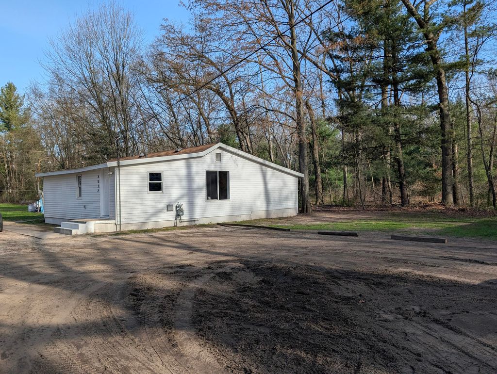 Photo of 2032 S Mill Iron Road, Muskegon, MI 49442 (MLS # 26017255)
