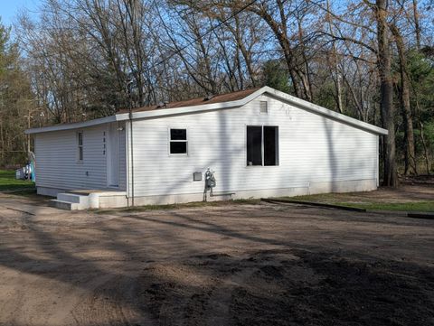 Photo of 2032 S Mill Iron Road, Muskegon, MI 49442 (MLS # 26017255)