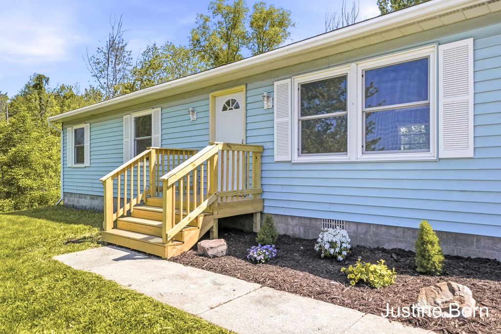 Photo of 8620 11 Mile Road NE, Rockford, MI 49341 (MLS # 26025249)
