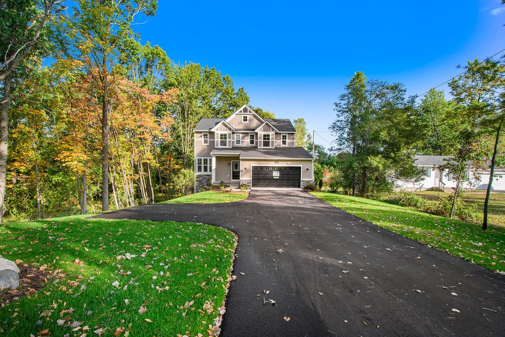 Photo of 5479 Ada Drive SE, Ada, MI 49301 (MLS # 25060396)