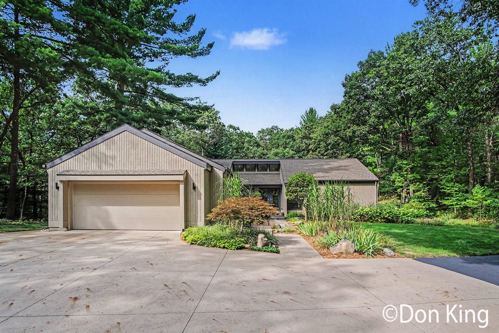 Photo of 9020 Bailey Drive NE, Ada, MI 49301 (MLS # 26047095)