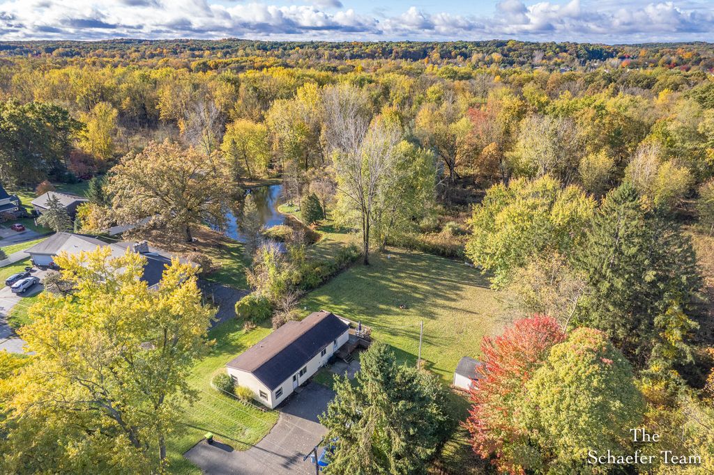 Photo of 8338 Fulton Street SE, Ada, MI 49301 (MLS # 25055314)