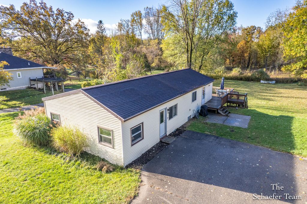 Photo of 8338 Fulton Street SE, Ada, MI 49301 (MLS # 25055314)