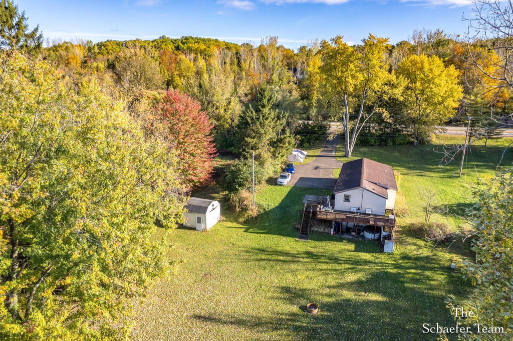 Photo of 8338 Fulton Street SE, Ada, MI 49301 (MLS # 25055314)