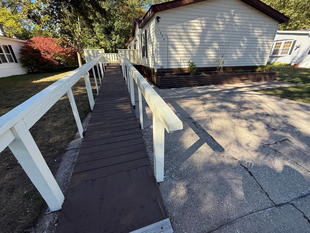 Photo of 1699 Sycamore Drive, Muskegon, MI 49445 (MLS # 25051853)