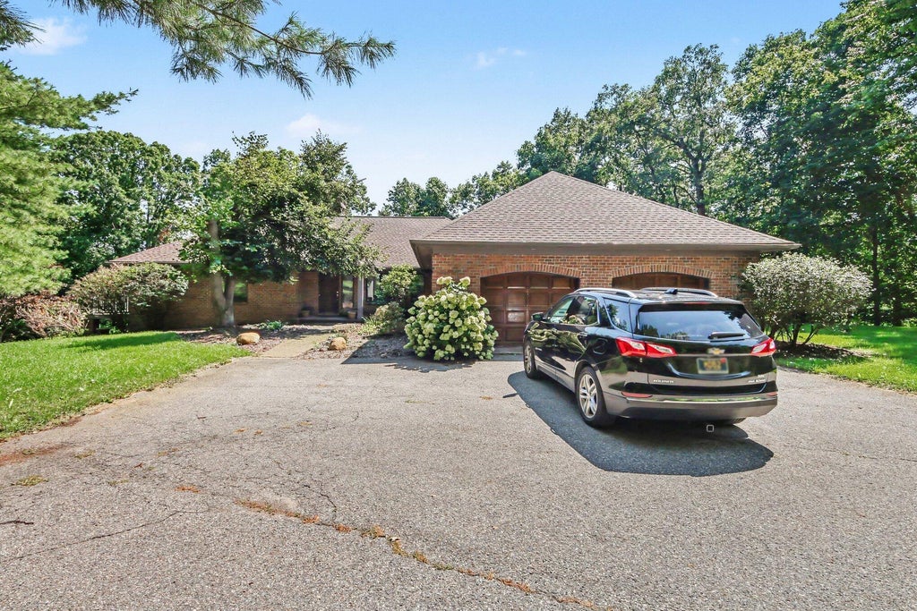 Photo of 5075 Spring Ridge Drive NE, Ada, MI 49301 (MLS # 26046226)