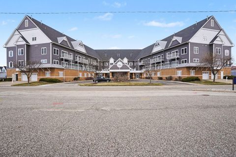 Photo of 917 W Savidge Street #38, Spring Lake, MI 49456 (MLS # 26011476)