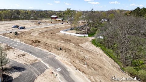 Photo of 5575 Black Berry Bluff Ct SE, Kentwood, MI 49512 (MLS # 26017234)