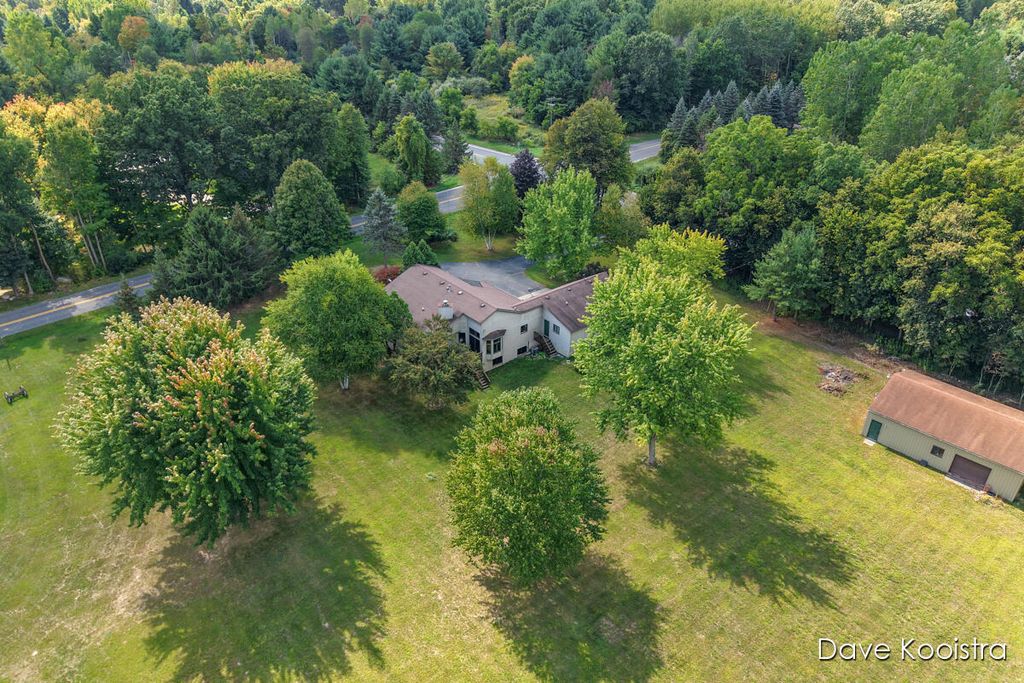 Photo of 9610 Grange Avenue NE, Rockford, MI 49341 (MLS # 25049961)