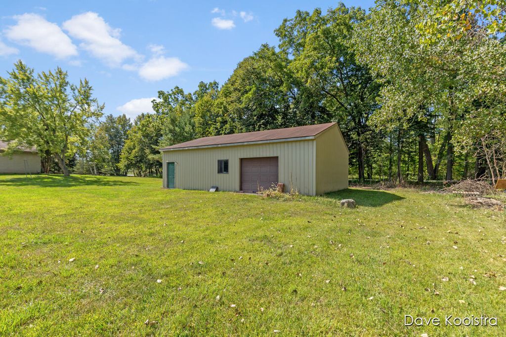 Photo of 9610 Grange Avenue NE, Rockford, MI 49341 (MLS # 25049961)