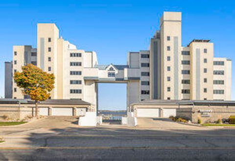 Photo of 2964 Lakeshore Drive #E102, Muskegon, MI 49441 (MLS # 25055937)