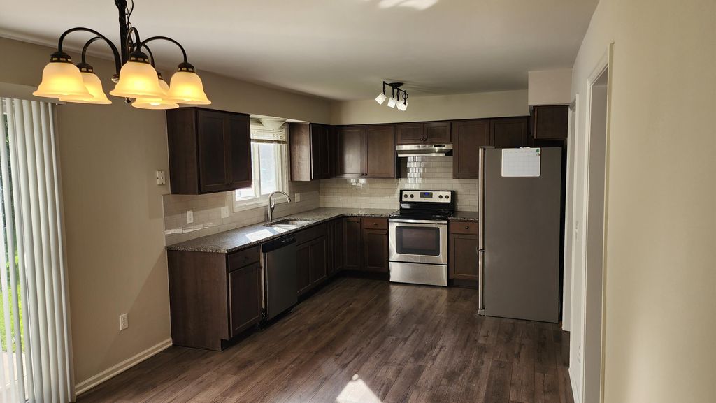 Photo of 8424 Annsbury Drive, Shelby Twp, MI 48316 (MLS # 25058599)