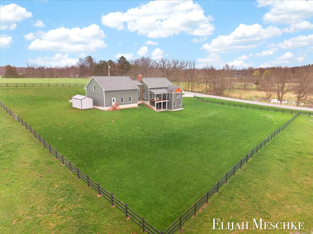 Photo of 8977 2 Mile Road NE, Ada, MI 49301 (MLS # 26015968)