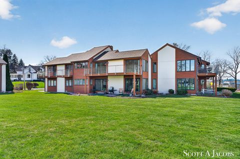Photo of 1131 S Shore Drive, Holland, MI 49423 (MLS # 26013627)