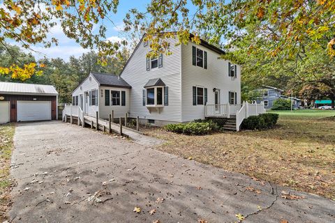 Photo of 559 E Sands Street, Pentwater, MI 49449 (MLS # 25054469)