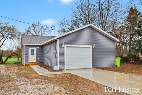 Photo of 1111 E Pearl Street, Greenville, MI 48838 (MLS # 26016619)
