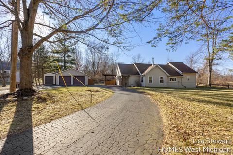 Photo of 4011 Buttrick Avenue SE, Ada, MI 49301 (MLS # 26008998)