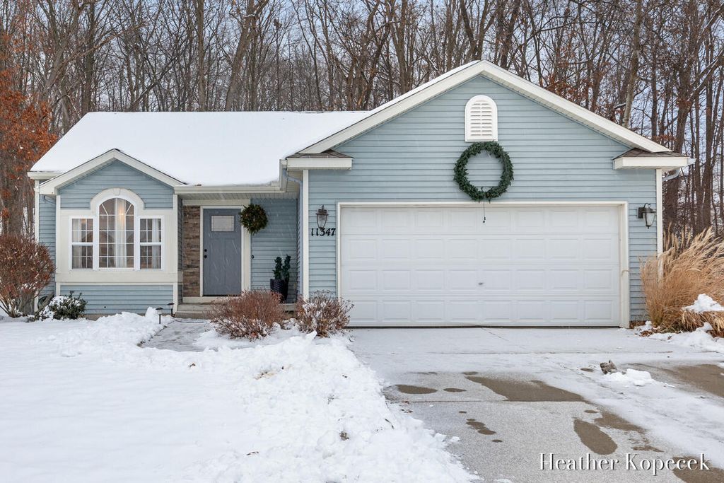 Photo of 11347 Trent Street SE, Lowell, MI 49331 (MLS # 25060808)