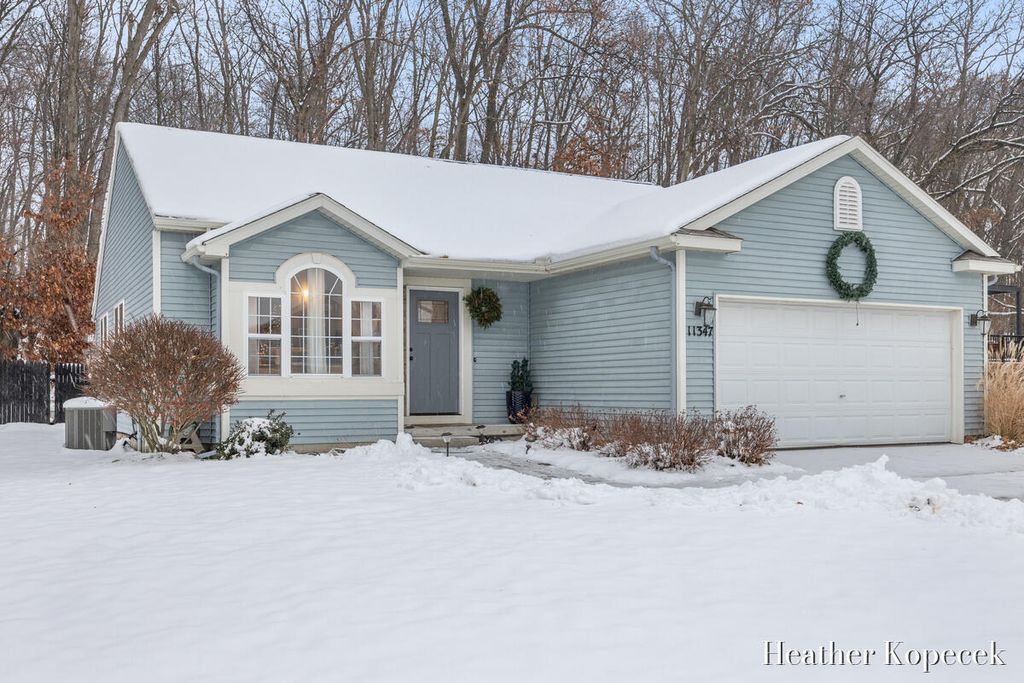 Photo of 11347 Trent Street SE, Lowell, MI 49331 (MLS # 25060808)