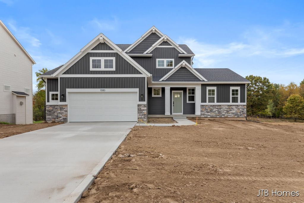 Photo of 1080 N Washington Street SE, Lowell, MI 49331 (MLS # 25042071)