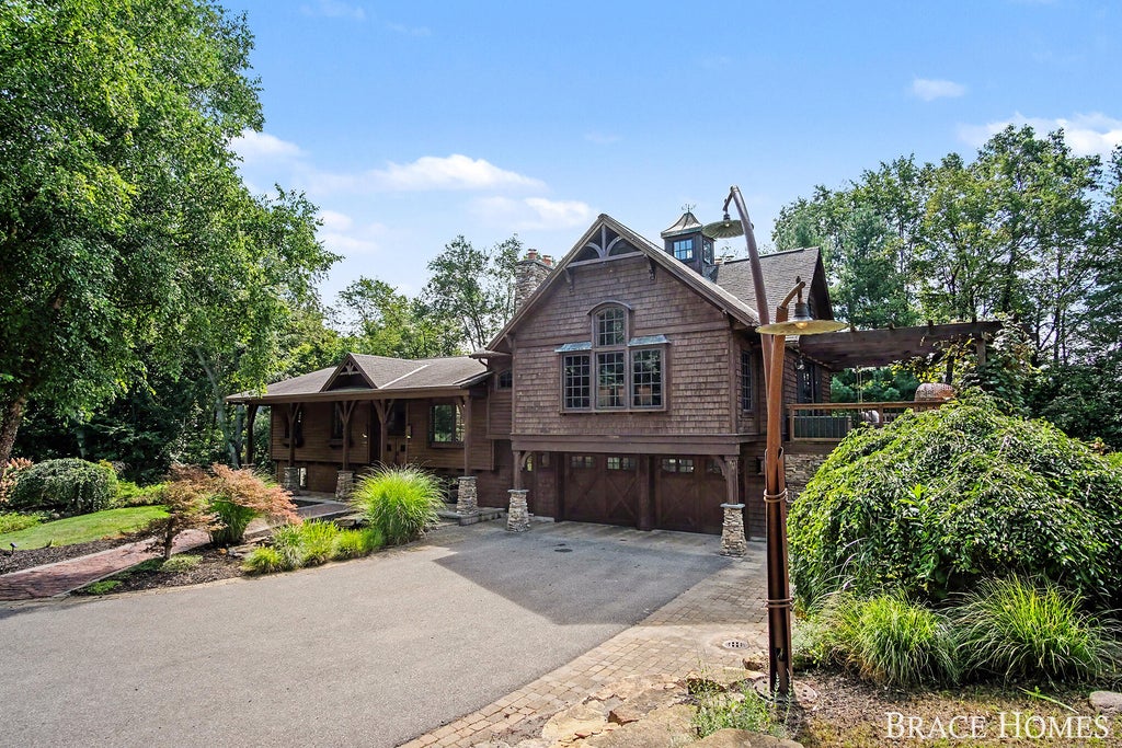 Photo of 5501 Canyon River Drive NE, Ada, MI 49301 (MLS # 26045169)