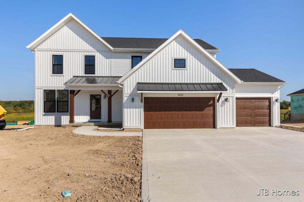 Photo of 6642 Ravine Point Drive NE, Rockford, MI 49341 (MLS # 25056036)