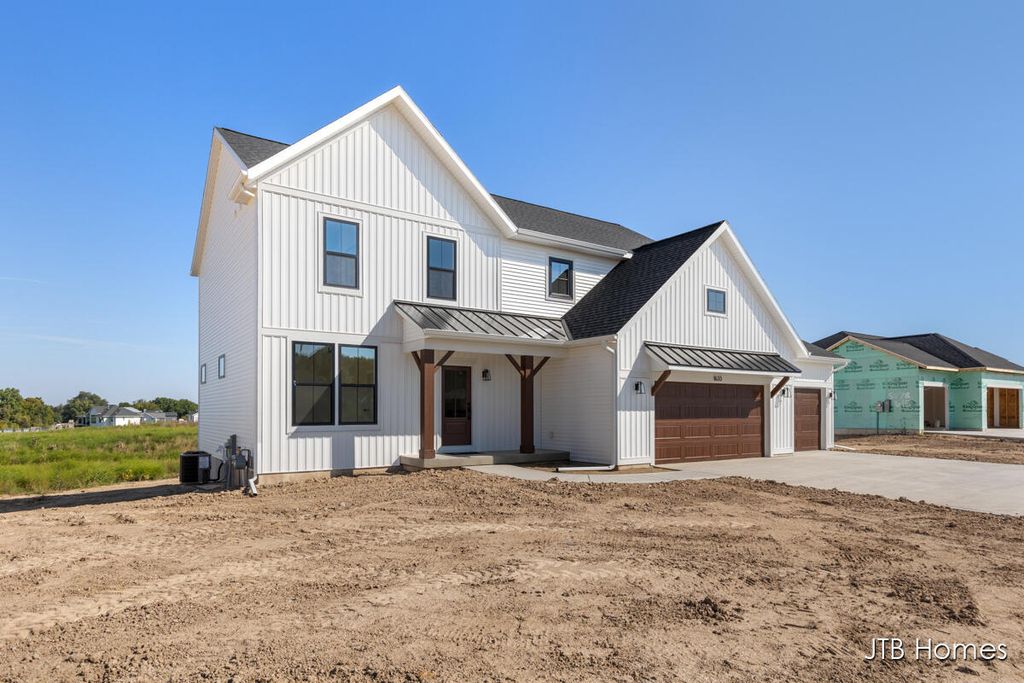 Photo of 6642 Ravine Point Drive NE, Rockford, MI 49341 (MLS # 25056036)