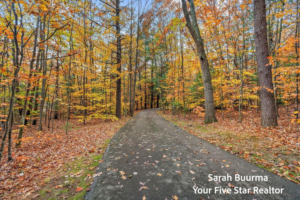 Photo of 6035 Scenic Woods Circle N, Muskegon, MI 49445 (MLS # 25059546)